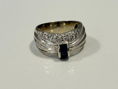 une image représentant une bague sertie d'une pierre noire