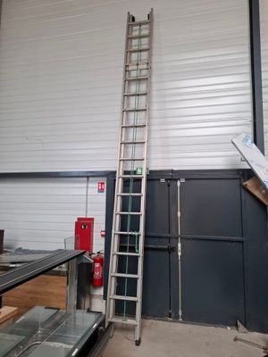 a ladder that is leaning against a wall in a building