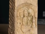 an image of a stone block with an image of a man and a woman on it