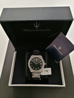 a black box with a watch inside of it