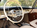 a view of the inside of a car with a steering wheel