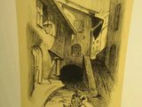 dessin représentant une maison devant laquelle se trouve un chat