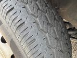 a close up of a tire on a vehicle