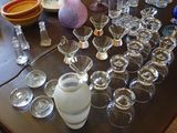 a table with a lot of empty glasses on it
