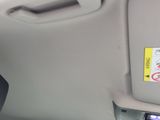 a close up of a car door with a sticker on it