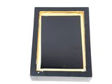 a picture of a black and gold picture frame