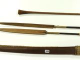 several different types of wood and metal items on a white surface