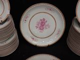 a lot of plates that are stacked on top of each other