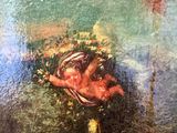 a painting on the wall of a building that has a painting of a bird on it