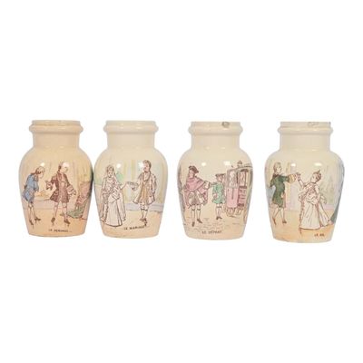 three vases with pictures of people on them sitting next to each other