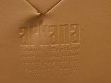 a close up of a brown bag with a label on it