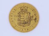 an image of a gold coin with a coat of arms on it