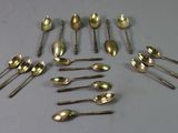 a lot of spoons and spoon spoons on the table
