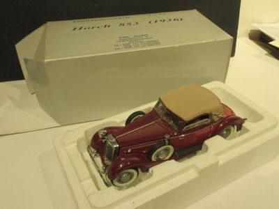 a toy car that is sitting on a tray