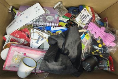 a cardboard box filled with various items that are in it