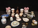 many different vases that are sitting on a table