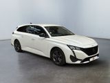 a white car is parked in a room with a gray floor