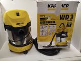 two vacuums are sitting on a shelf next to a box