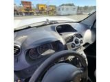 dashboard view of a car with a steering wheel and dashboard controls
