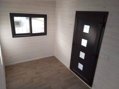 a room with a door and a window in it