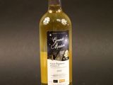 a bottle of wine that is sitting on a table