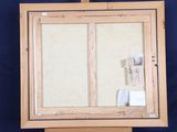 a picture of an easel with a piece of paper on it