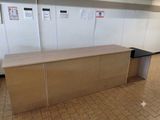 an image of a reception desk in a large room