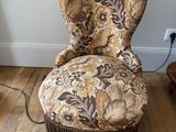 a chair that is sitting on a hard wood floor