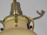 a light that is hanging from the ceiling in the room