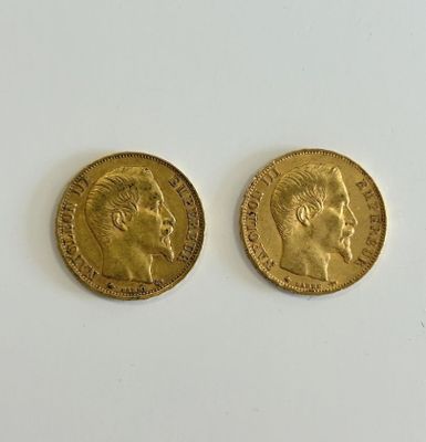 two gold sovereigns, one of which has a head of a man and the other of a woman
