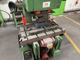 an image of a machine that is sitting in a garage