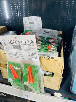 many different items on the shelf in the store