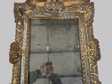 a man taking a picture of himself in a mirror