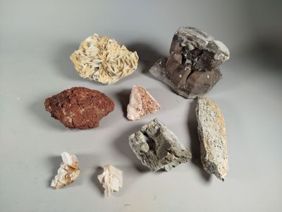 a lot of rocks that are sitting on a table