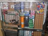 a large metal cage with a bunch of items inside of it
