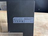 a close up of the back of a cell phone on a table