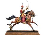 statue of a man riding a horse with a sword in his hand