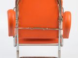 an orange chair with a metal frame on a white background