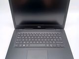 the dell laptop is open and ready to be used