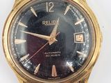 an image of a close up of a wrist watch on a white surface
