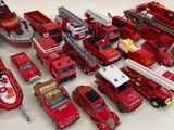 many different types of toy fire trucks and trucks