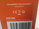 an orange box with a barcode on it sitting on a table