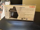 a box with a keyboard on it sitting on a table