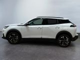 a white toyota c - hr suv parked in a white room