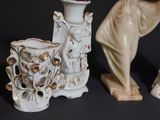 three vases sitting next to each other on a table