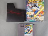 une image représentant un jeu Nintendo avec une boîte et deux jeux