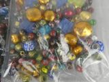 a bunch of chocolate eggs in a bag on a table