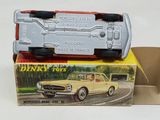 a toy car that is sitting on top of a box