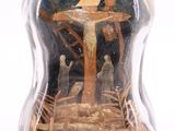 a glass bottle with a nativity scene inside of it