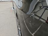 a reflection of a car in the side mirror of a car